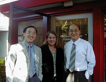 CVF President Kim Alexander meets with Chinese visitor Huang    Jie, Deputy Director of the Legislative Affairs Bureau of Xiamen Municipal    People's Government, and Larry Shen, translator, April 2002